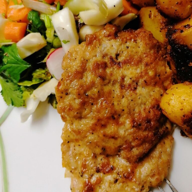 Chicken kebab patties with potatoes and salad