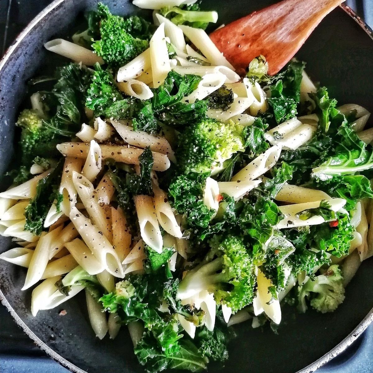 Pasta with green curly kale and broccoli