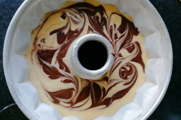 cake batter in a bundt tin