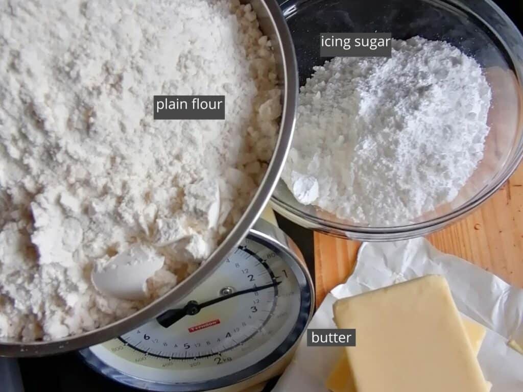 three ingredients to make kue putri salju - snow white butter cookies