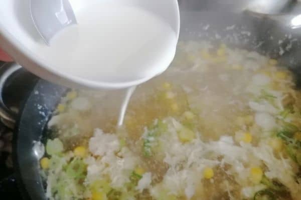 Adding the cornflour into the soup