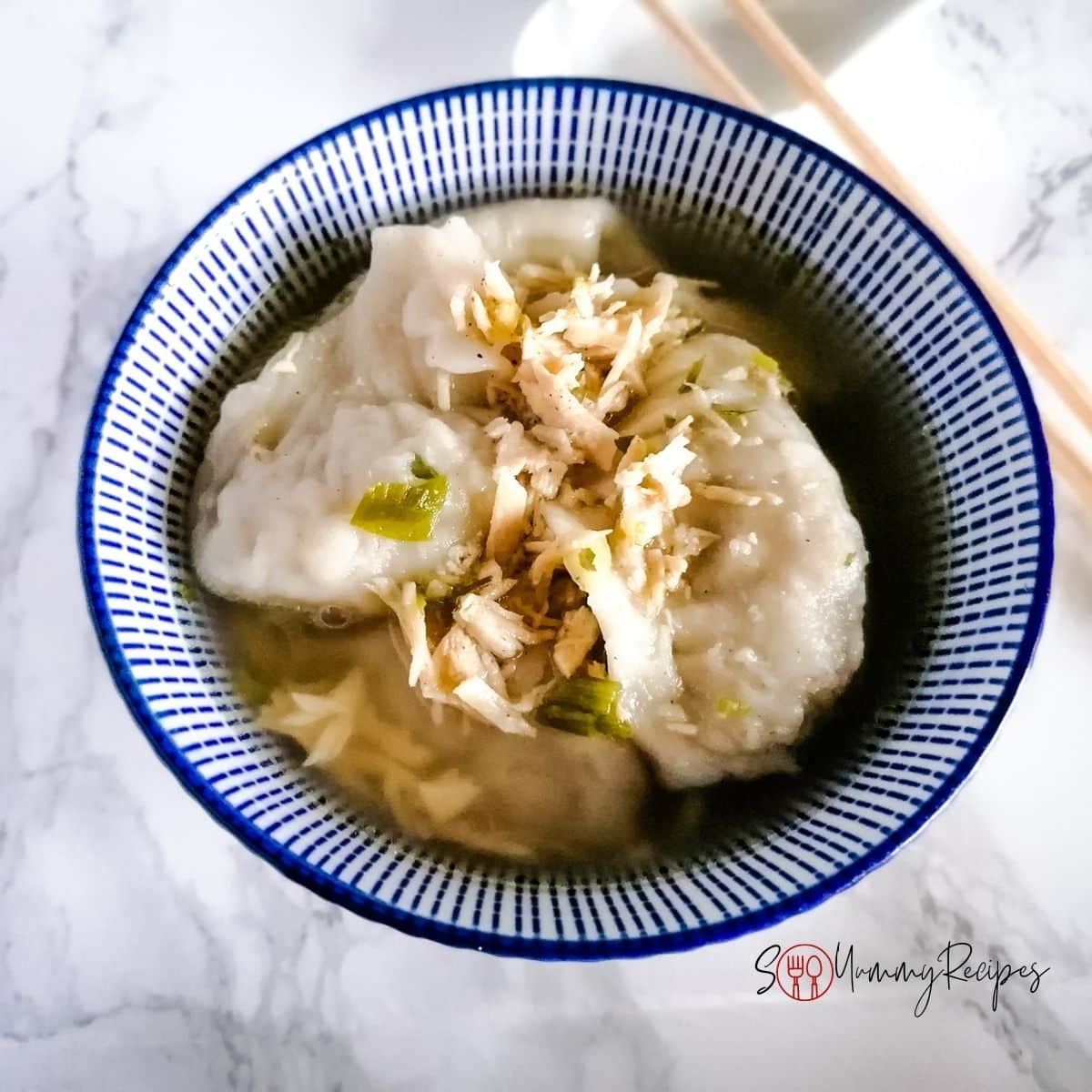 a bowl of Indonesian chicken wontons