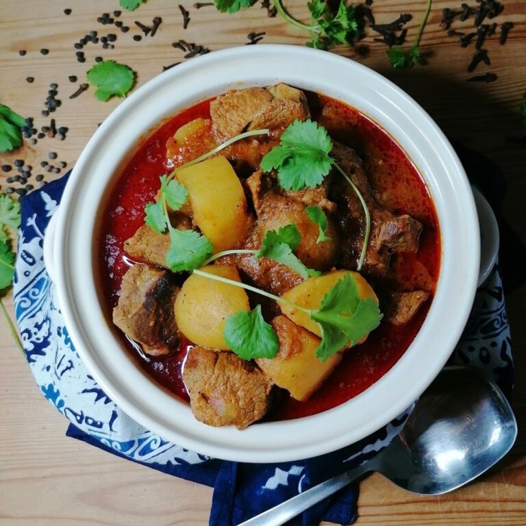 Pakistani aloo gosht - meat and potato curry