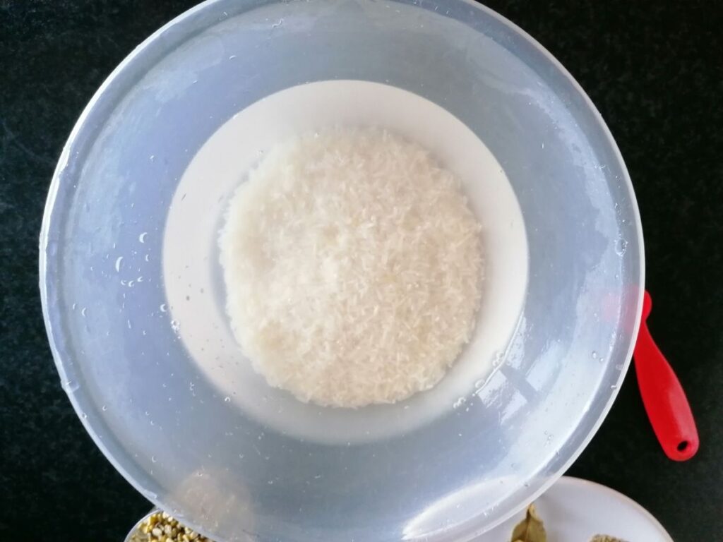 rice soaked in water for making kitchari