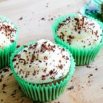 a few apple cupcakes with cream cheese frosting.