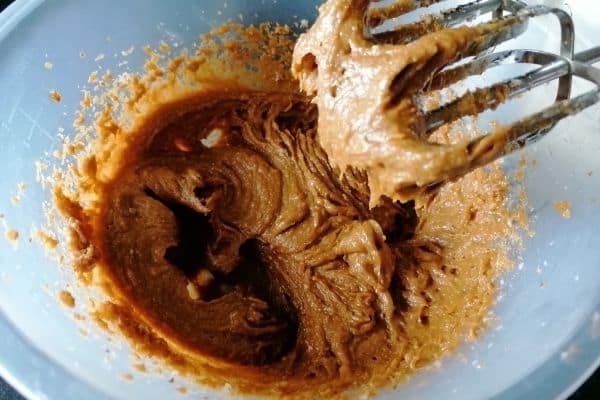 mixture of coconut oil, sugar and egg