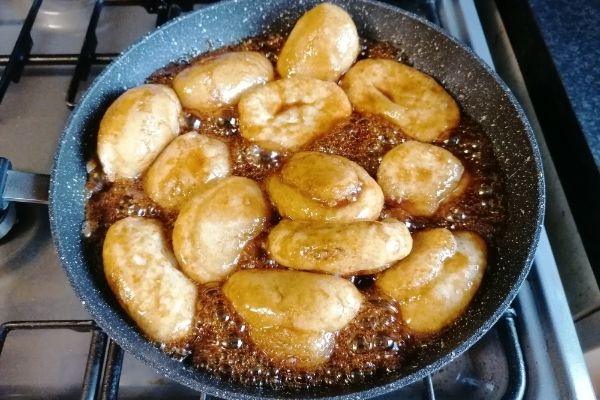 glutinous rice dough in brown sugar syrup