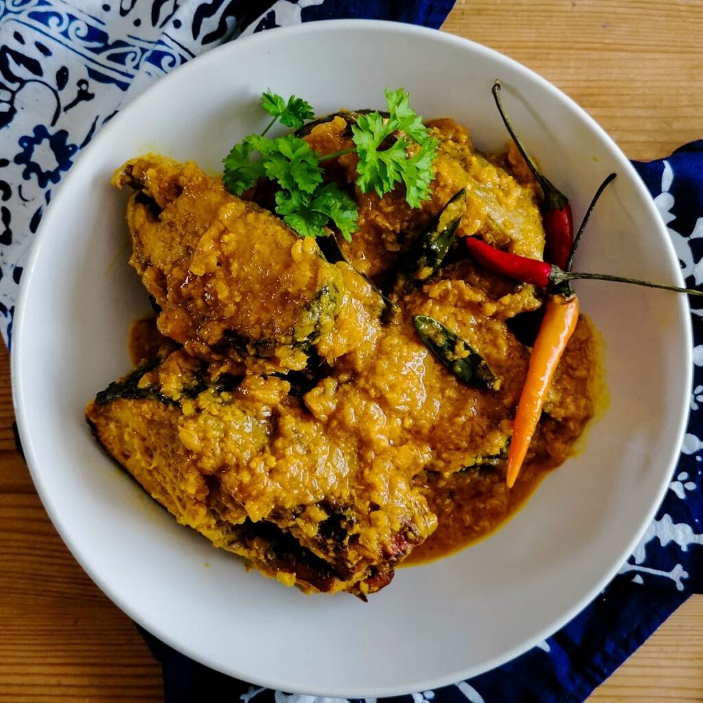 A bowl of Ikan Pesmol - the tangy and spicy fish dish from Indonesia