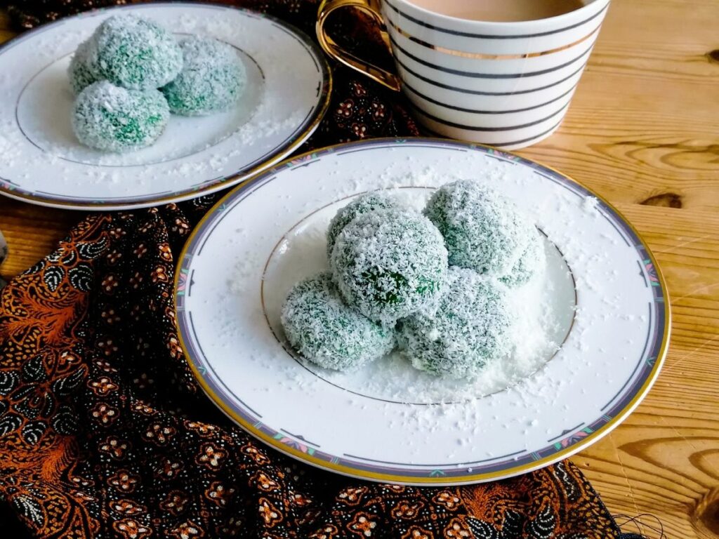 two plates of klepon - Indonesian glutinous rice balls