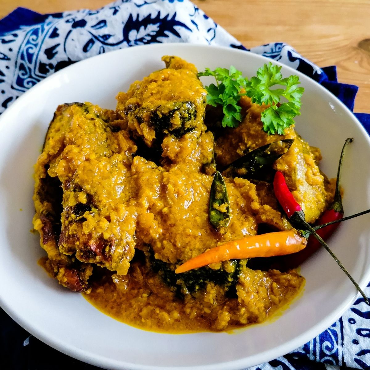 A dish of Pesmol Ikan - fish dish in tangy and spicy sauce from west Java