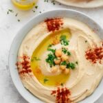 a plate of hummus.
