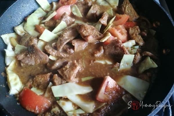 lamb and vegetables on a pan