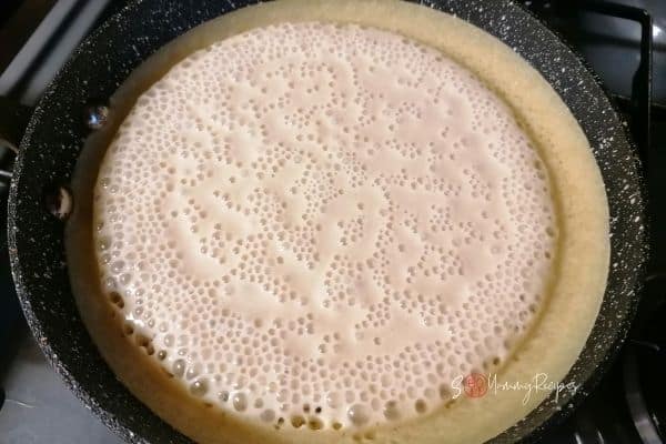 martabak manis batter on the frying pan
