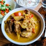 a bowl of lamb tongseng - javanese braised lamb in spice coconut milk