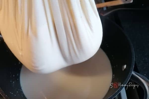 sieving the soya milk