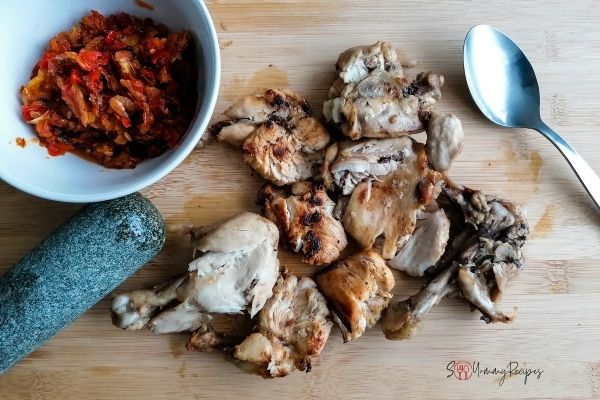 fried chicken and a bowl of chilli sauce