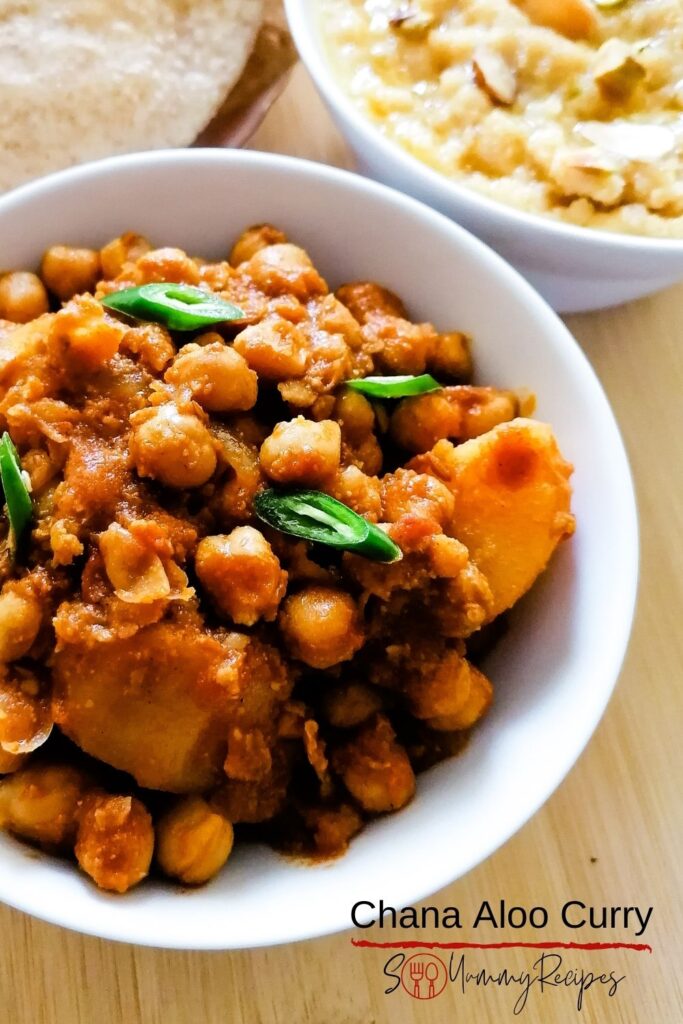 a bowl of chana aloo curry with overlay text