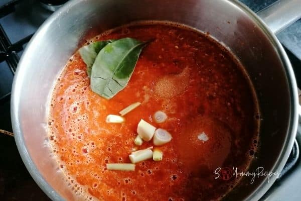 blended chillies and herbs in a cooking pan