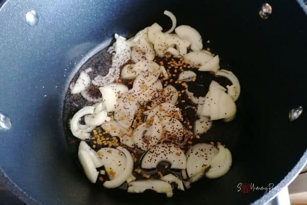 frying onion slices with fenugreek seeds