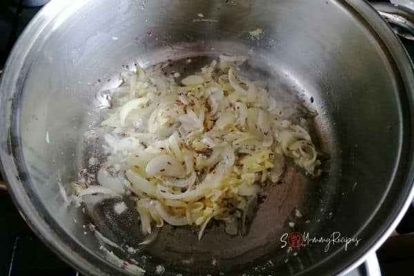 frying onion with ginger and garlic