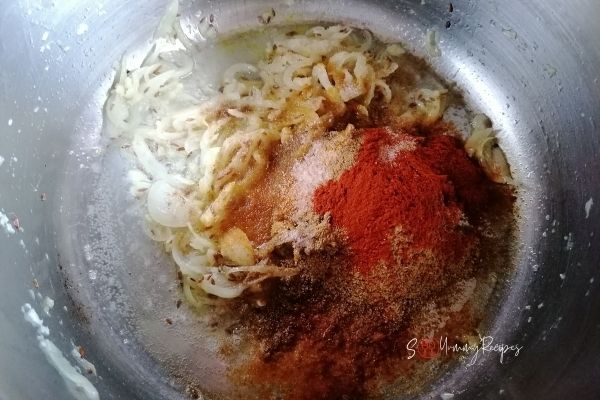 frying spices and onion