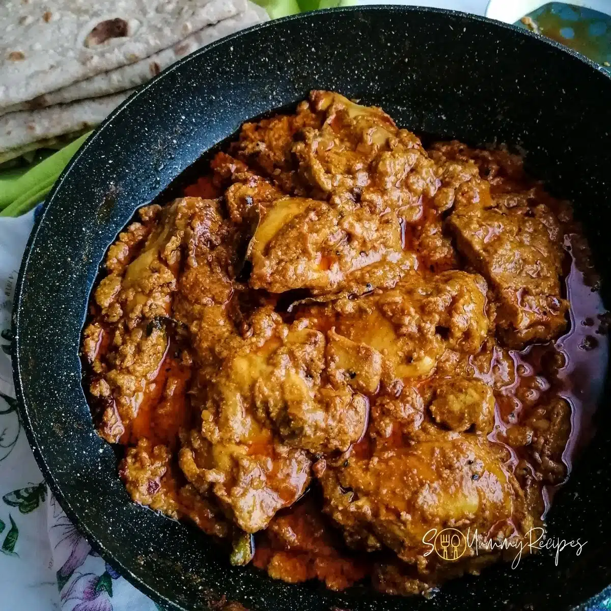 Achari chicken in cooking pan