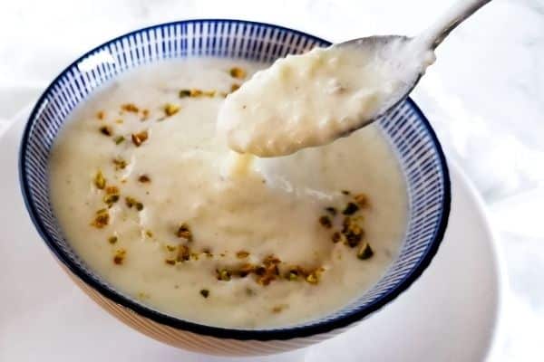 Kheer the Pakistani rice pudding in a blue bowl