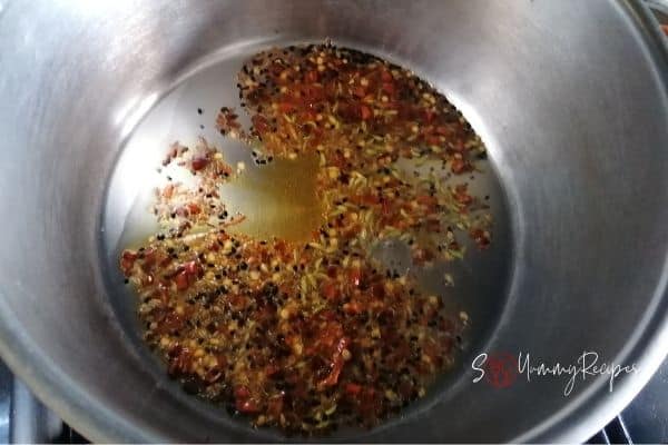 spices frying in a pan