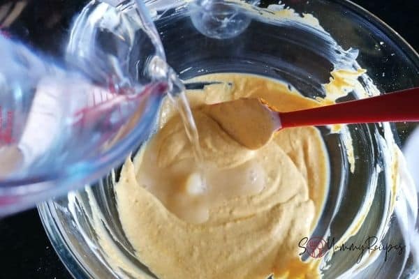 adding water in yoghurt mixture