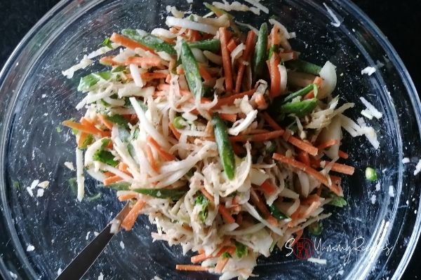 a mix of sliced and grated vegetables
