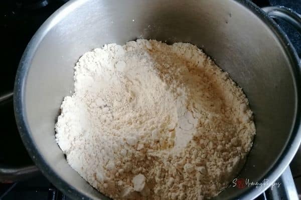 gram flour in the cooking pan