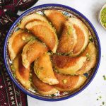 a plate of Atayef - the middle eastern pancakes.