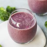 a glass of blueberries smoothie.