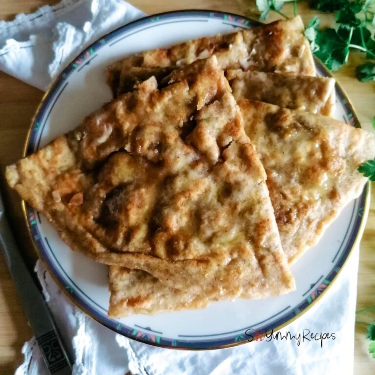 four pieces of aloo paratha - Pakistani fried flatbread with potato stuffing