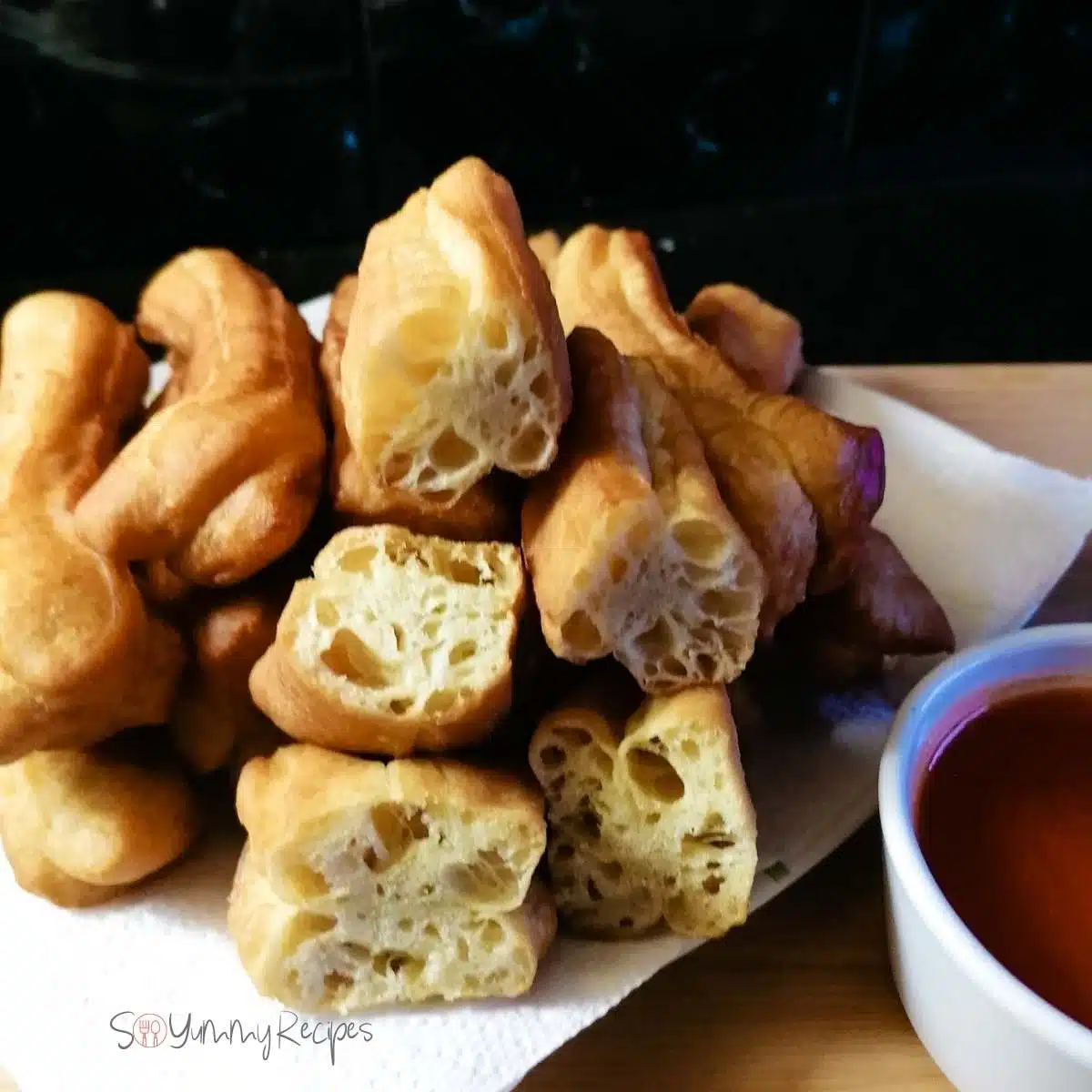 a stack of Cakwe - the Indonesian fried dough sticks.