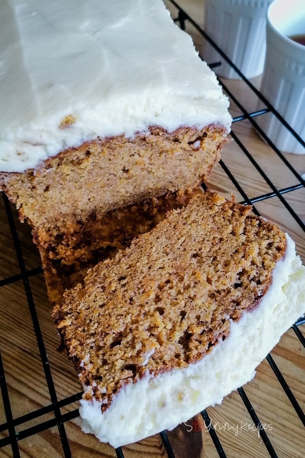 Carrot cake loaf that has been cut into a slice