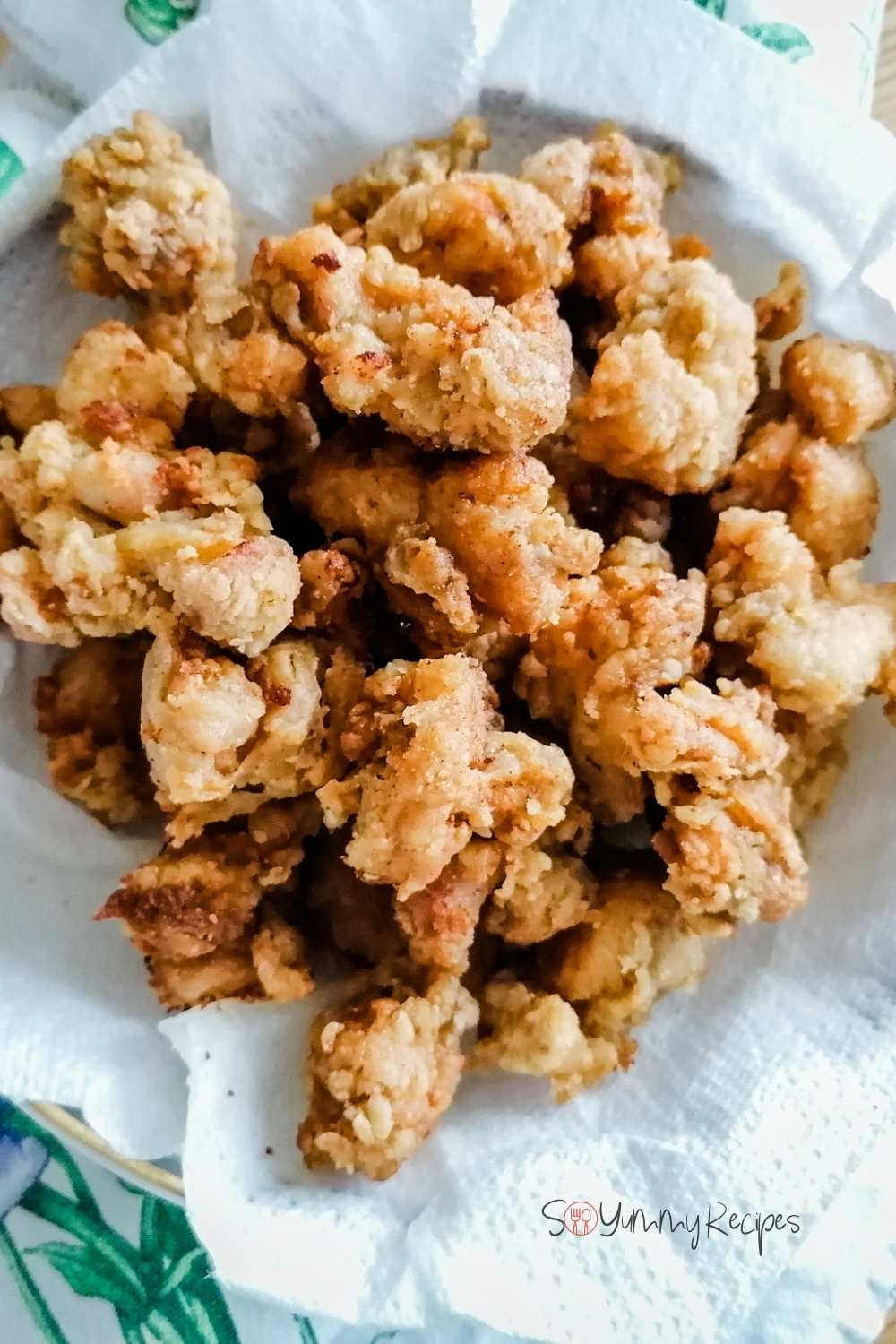 some crunchy chicken popcorn on white napkin