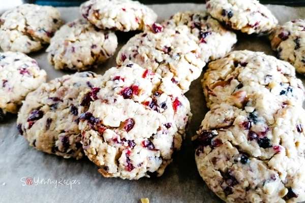 muesli cookies on a baking tray lined with greaseproof paper
