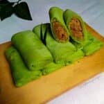 Indonesian rolled pancakes with coconut stuffing - Dadar Gulung.