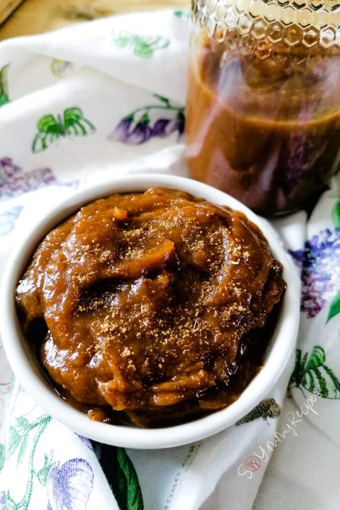 a bowl and a jar of imli sauce the sweet and spicy tamarind sauce in Pakistani style.