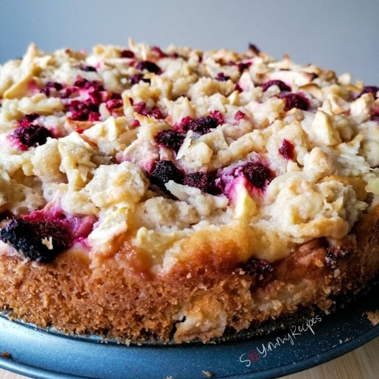 Apple crumble cake on a non-stick pan.