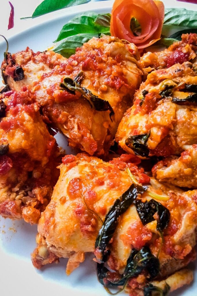A closeup of Ayam Rica Rica  the chicken dish cooked in spicy chillies from Manado Indonesia.