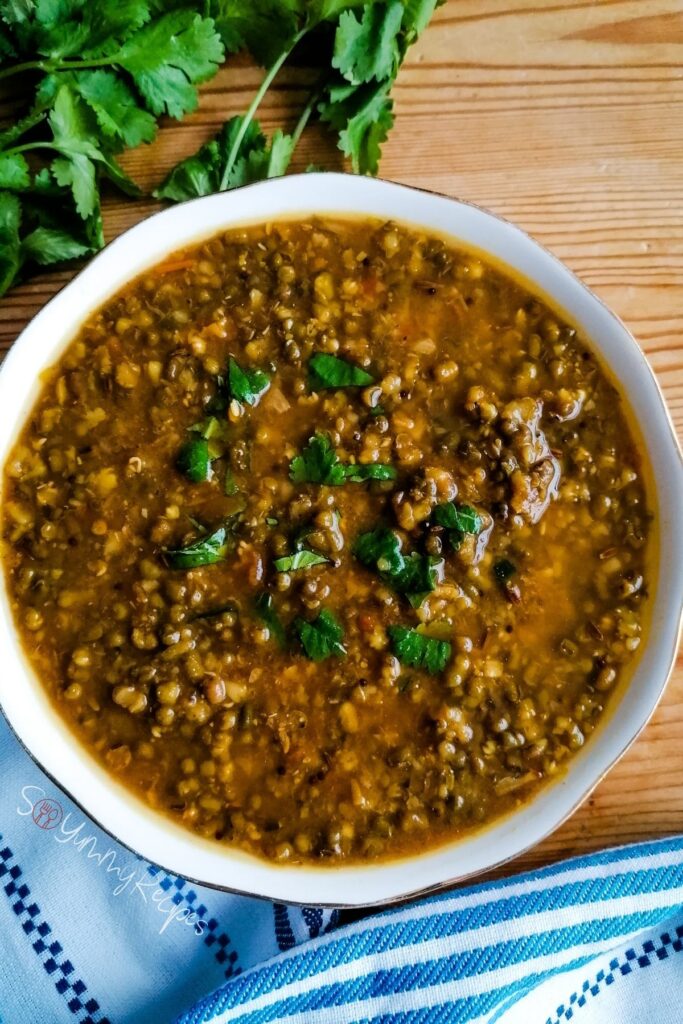 Pakistani Moong dal curry in a round bowl.