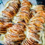 A dish of sweet potato gratin cooked in a microwave.