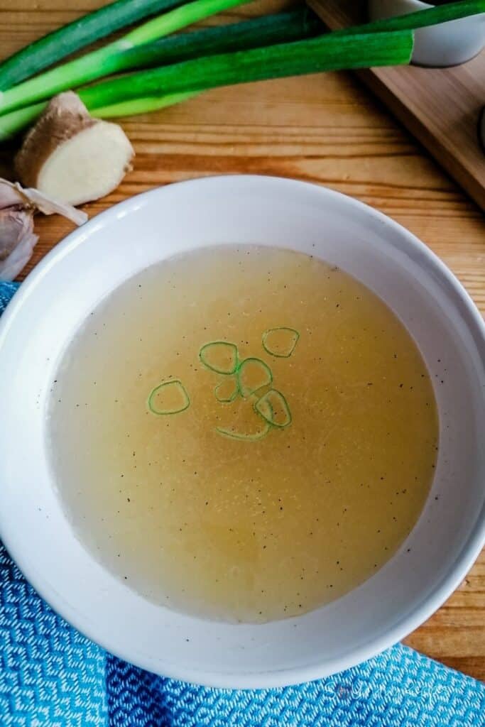 A bowl of chicken stock.