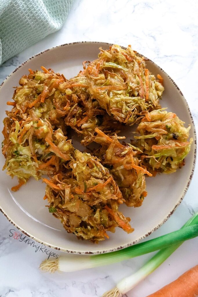 Indonesian vegetable fritters on a plate.
