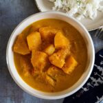 A round bowl of butternut squash curry.
