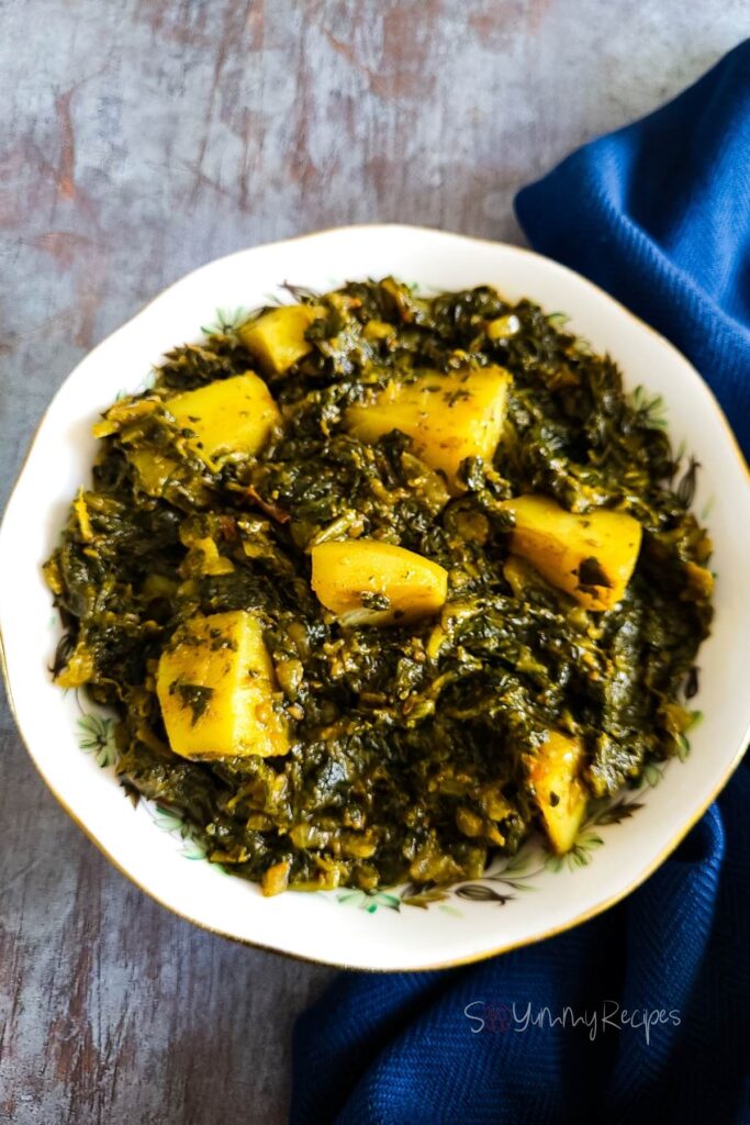 A bowl of Aloo Palak the potato and spinach curry.