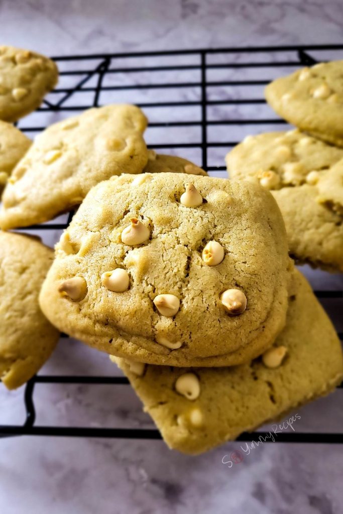 A closeup of white chocolate chip cookies.
