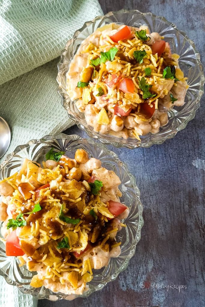 two bowls of potato and chickpea salad - papdi chaat.